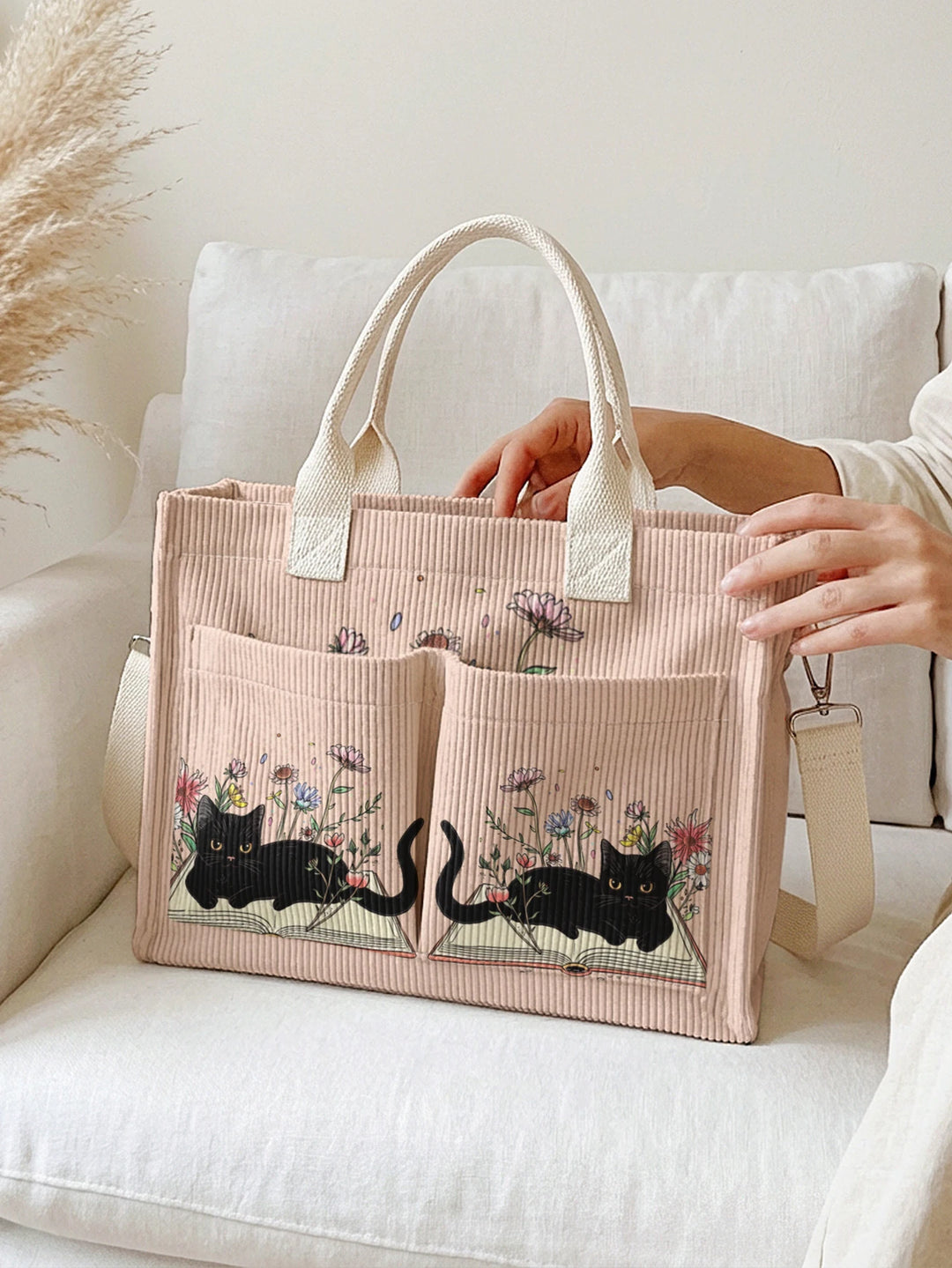 Sac à dos en velours côtelé rose avec impression de chat noir mignon et de livres, grande capacité et plusieurs poches pour les amoureux des chats, adapté pour les trajets domicile-travail.