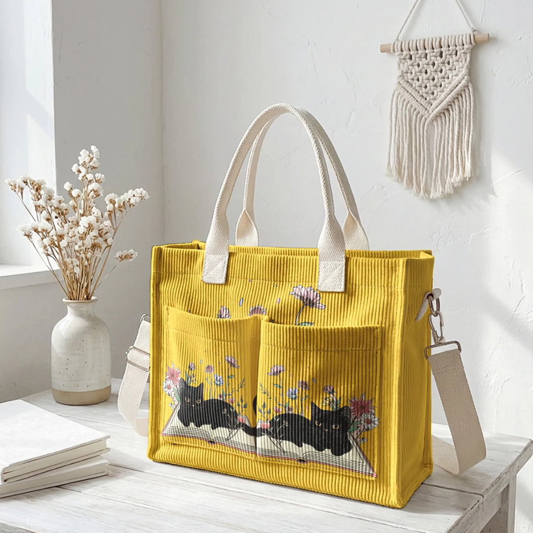 Sac à dos en velours côtelé rose avec impression de chat noir mignon et de livres, grande capacité et plusieurs poches pour les amoureux des chats, adapté pour les trajets domicile-travail.