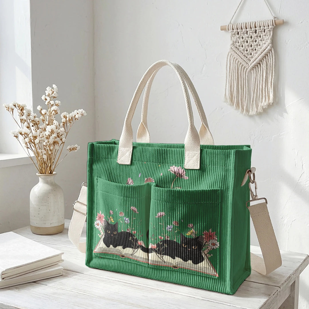 Sac à dos en velours côtelé rose avec impression de chat noir mignon et de livres, grande capacité et plusieurs poches pour les amoureux des chats, adapté pour les trajets domicile-travail.