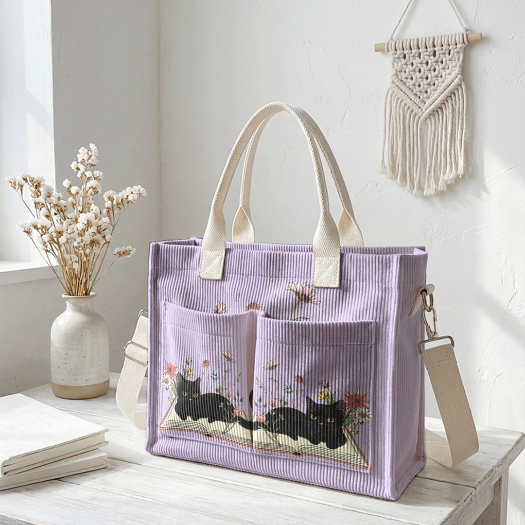 Sac à dos en velours côtelé rose avec impression de chat noir mignon et de livres, grande capacité et plusieurs poches pour les amoureux des chats, adapté pour les trajets domicile-travail.